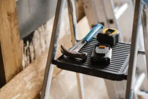 How To Repair A Leaking Flat Roof And Prevent Future Damage 1 Closeup Shot Hummer Tools Stairs House Construction