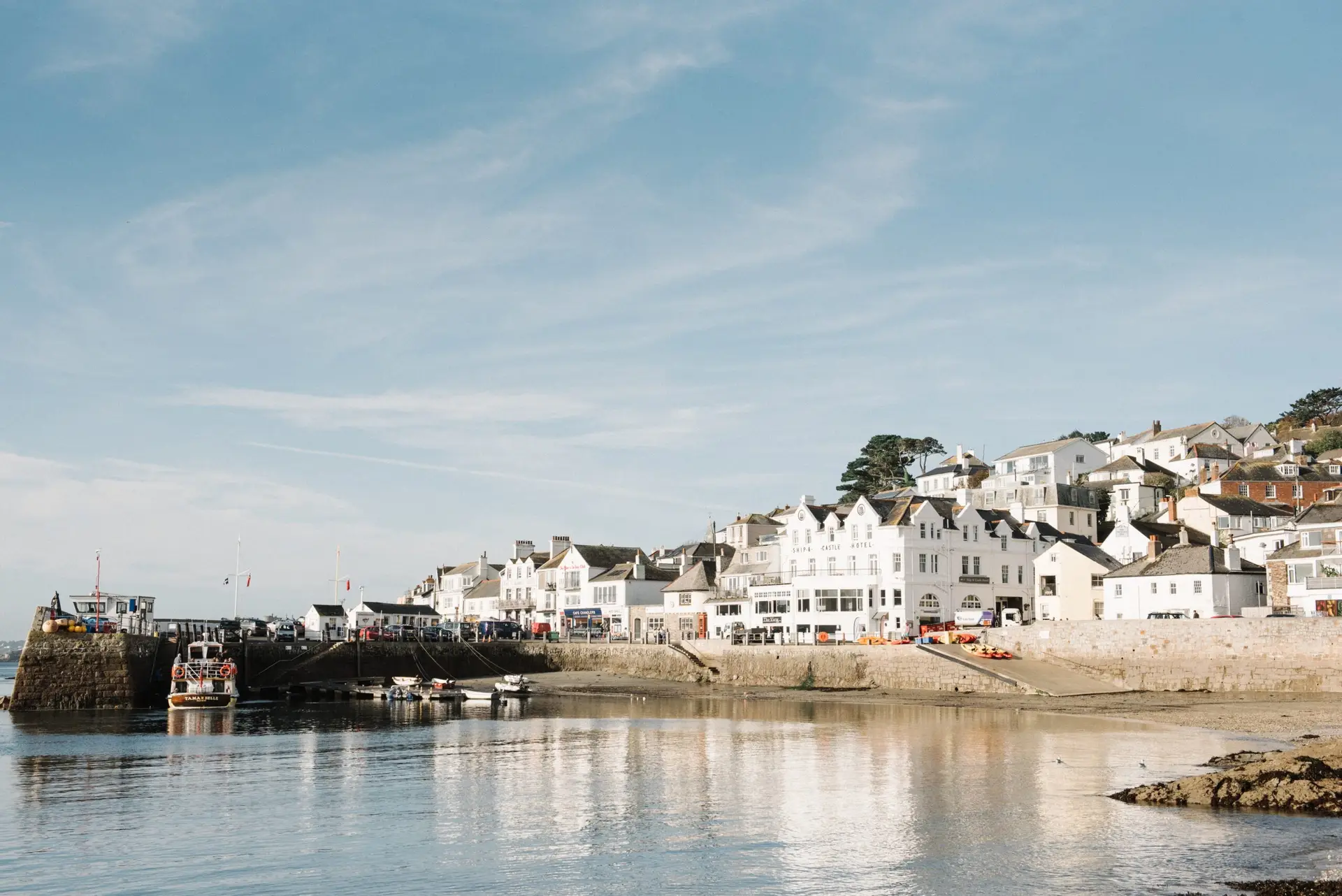 How Long Does A Roof Last? 2026 Lifespan Guide For Nyc 1 Beautiful Scenery White Apartments Waterfront Site Beautiful Blue Sky Scaled