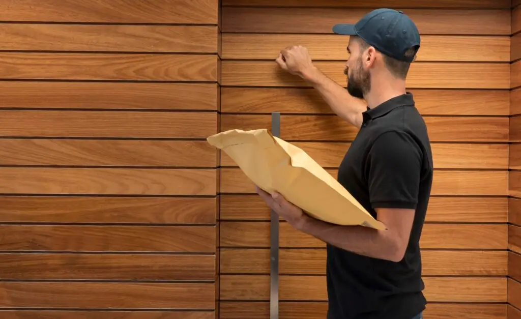 What Are The Different Types Of House Siding? 1 Delivery Man Delivering Package