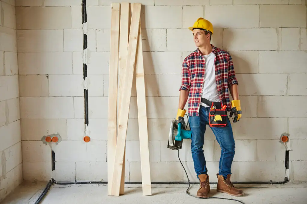 What Are The Different Types Of House Siding? 1 Portrait Confident Young Carpenter