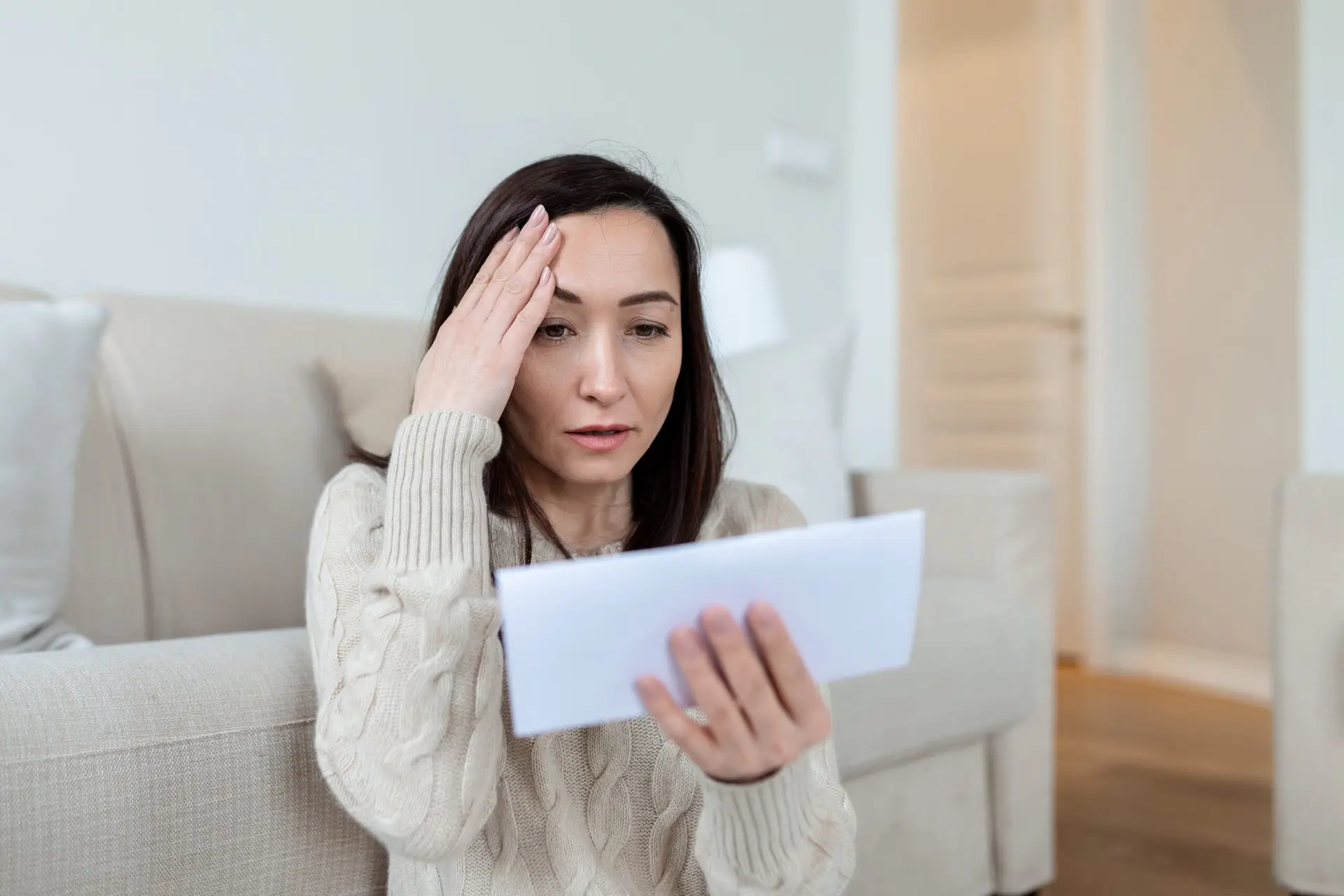 7 Signs Your Nyc Commercial Roof Needs Replacement In 2026 1 Portrait Worried Asian Woman Looking Received Letter Home Beautiful Woman With Worried Facial Expression Looking Received Mail Scaled