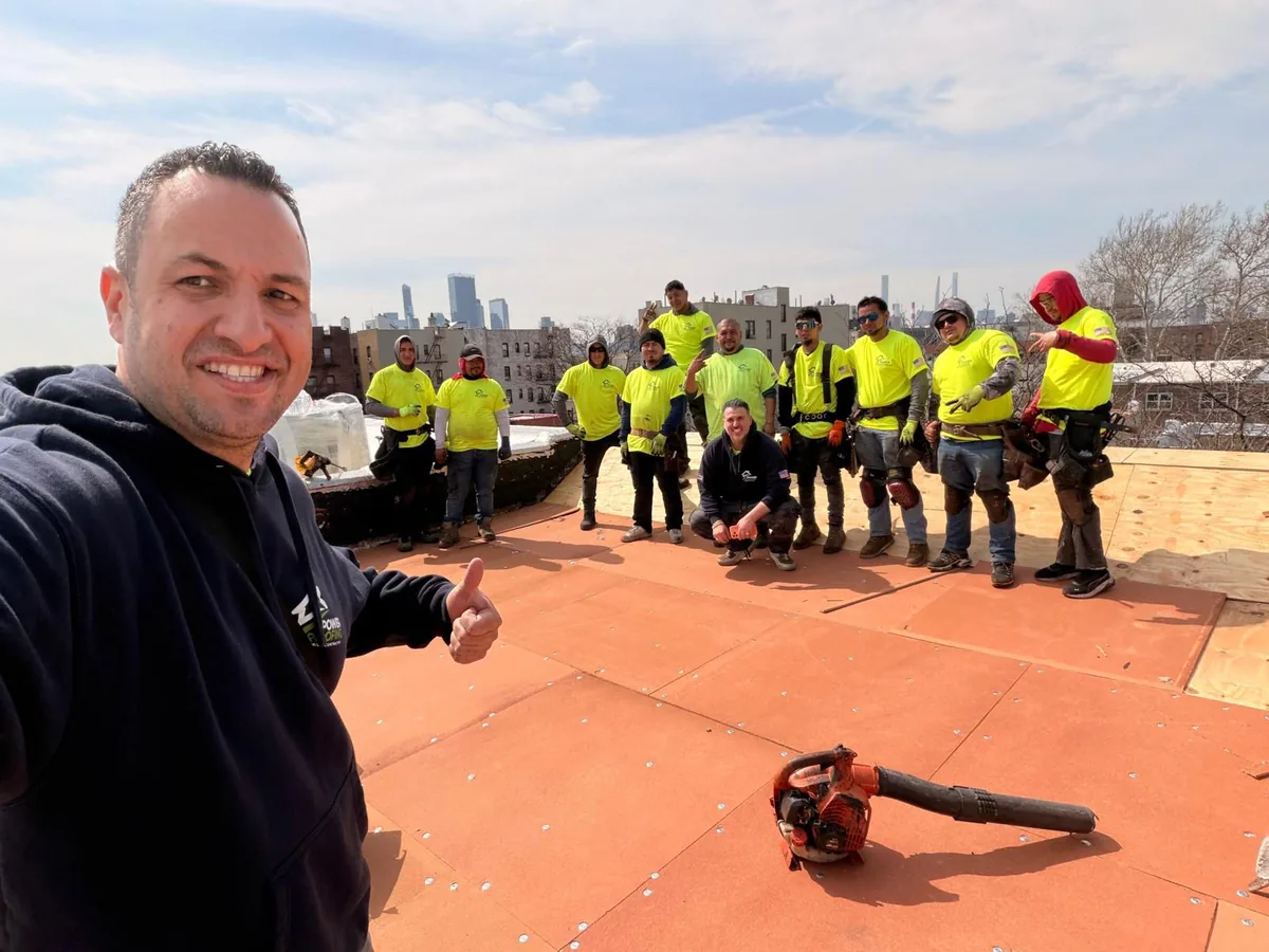 Meet The Power Roofing Nyc Crew Before Your Free Estimate Power Roofing Nyc Crew On A Brooklyn Rooftop, The Team That Shows Up For Your Free Roofing Estimate